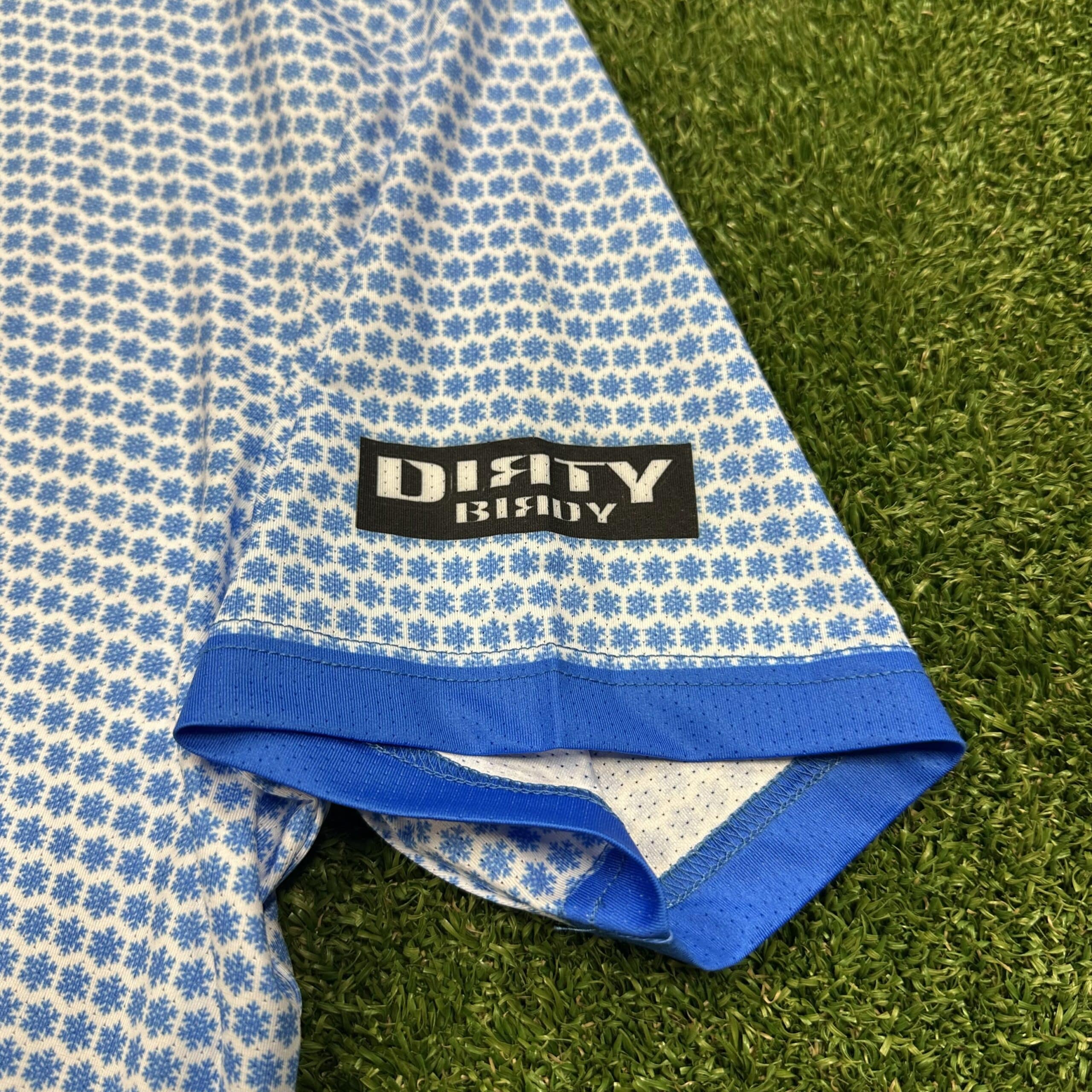 snowflake golf polo